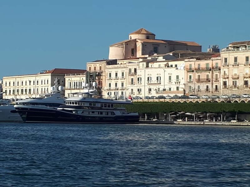 Syracuse: Ortigia and Neapolis Guided Walking Tour - Neapolis Archaeological Park: theaters, sound, and serious stonework