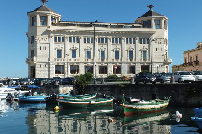 Tour of the island of Ortigia and exploration of sea caves with baths. - Price and Value at About $24: Short, Guided, and Actually Useful